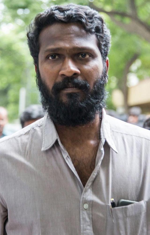 Vetrimaaran is known for his gritty, realistic approach to storytelling. His films often depict raw, intense narratives with strong socio-political themes.
