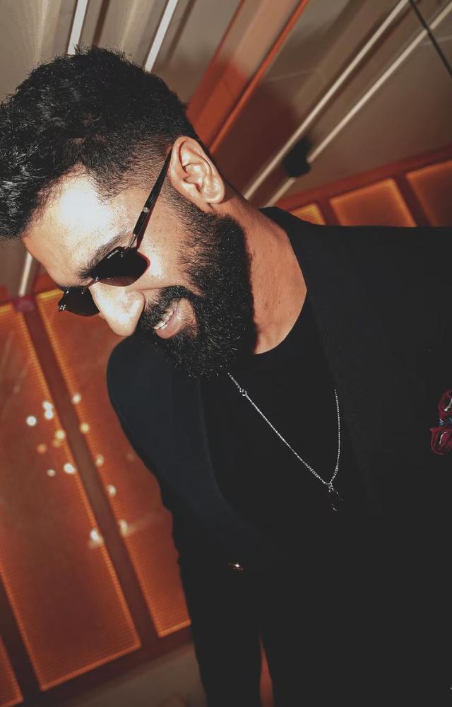 Vicky`s distinctive stance and body language define his trademark. He captivates with a commanding presence and unparalleled style.