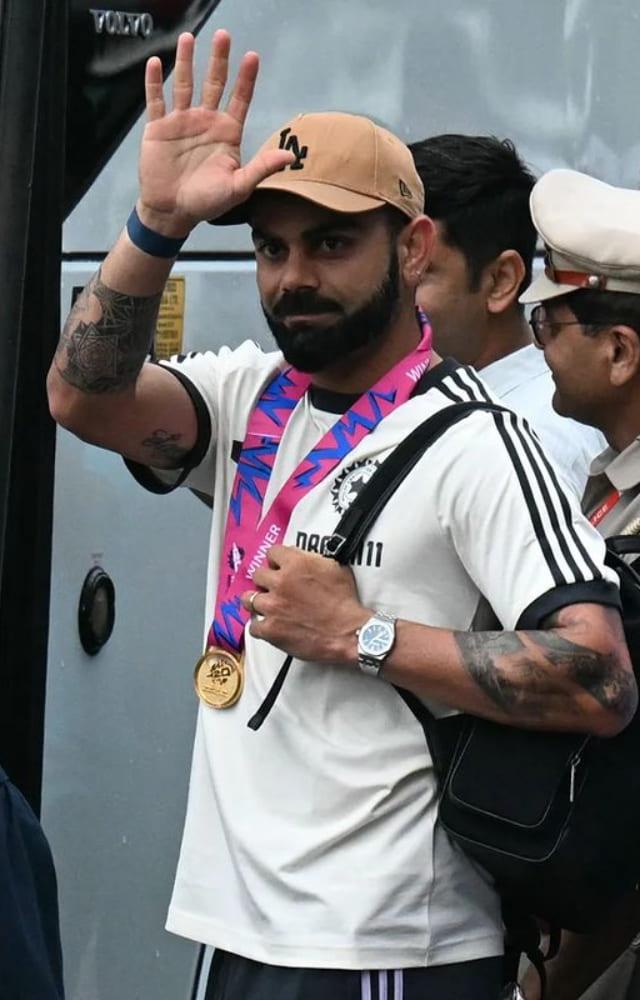 As Team India arrives in New Delhi, Virat Kohli poses for the shutterbugs before meeting with Indian Prime Minister Narendra Modi.