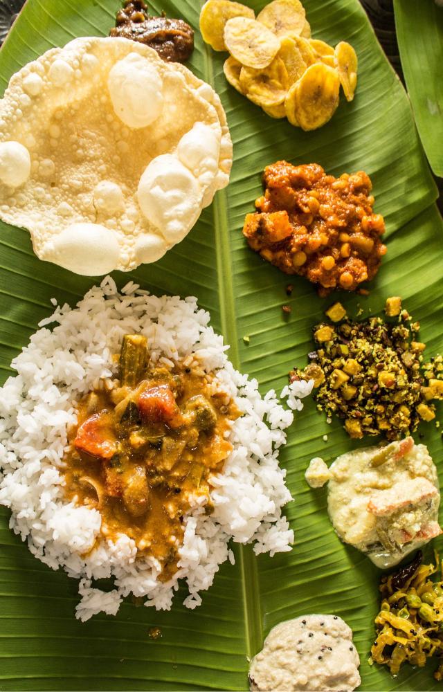Cook a delicious feast together, featuring traditional Kerala dishes like avial, payasam, and banana chips.