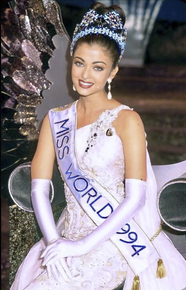 When she was crowned Miss World, she wore a white gown with one shoulder embellished with a pair of white gloves that shone.