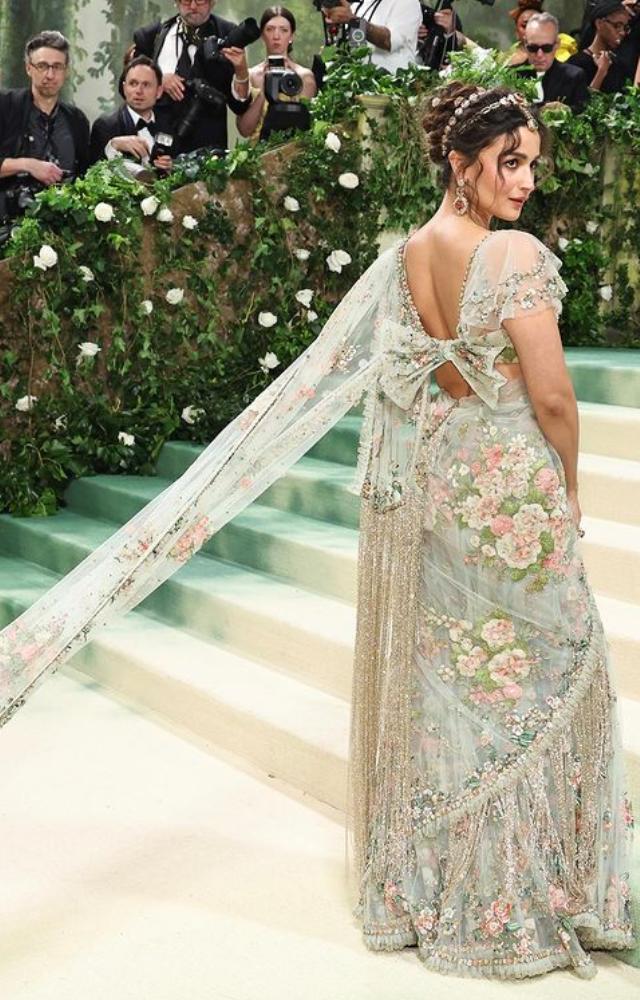 Alia Bhatt graced the event in a breathtaking saree, showcasing the timeless elegance of this traditional Indian garment.