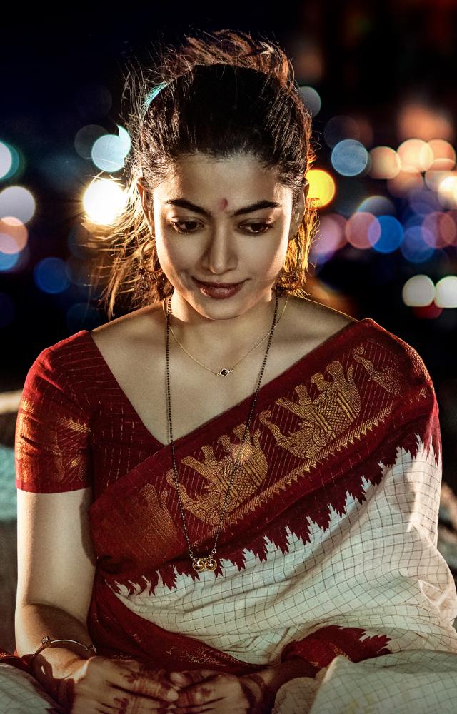 Rashmika Mandanna shines as Geetanjali Singh 'Geeta,' the captivating spouse of Ranbir Kapoor, bringing grace and charm to their on-screen love story.