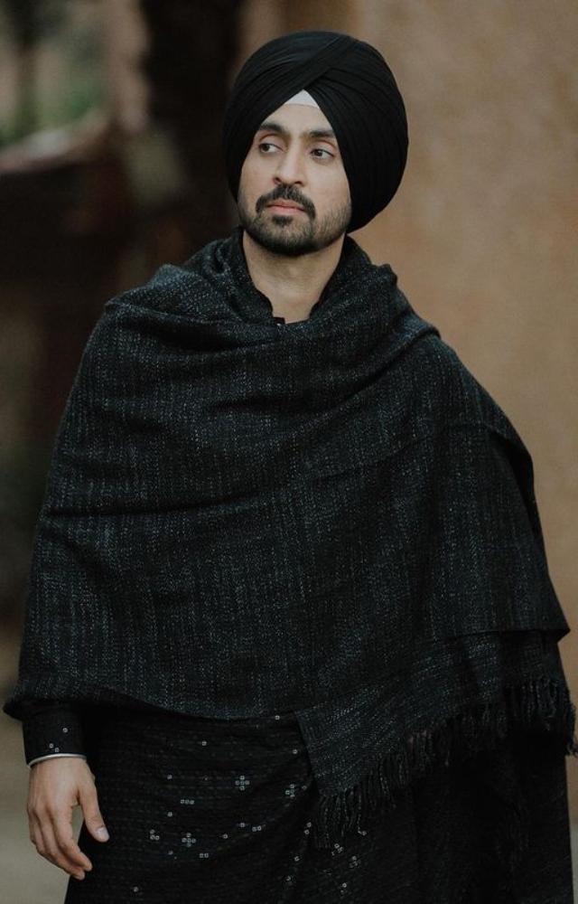 Diljit Dosanjh combines sleek refinement with his natural charisma and captivating presence to effortlessly enchant in a black ensemble.