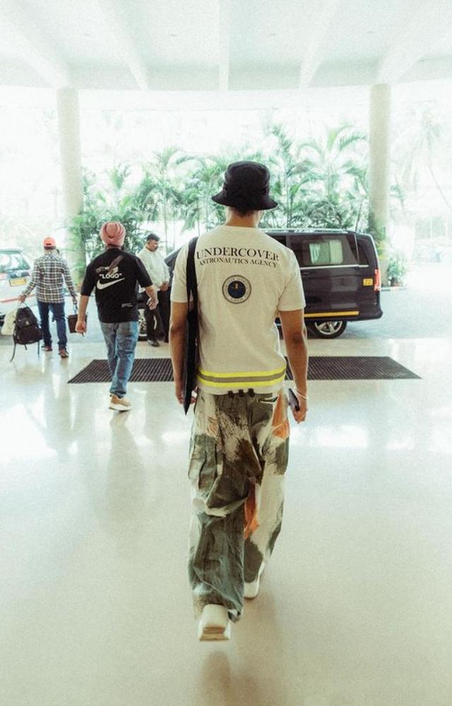 Leaving for a shoot, Diljit Dosanjh steps out from his hotel, exuding star power and anticipation for another day of cinematic magic.