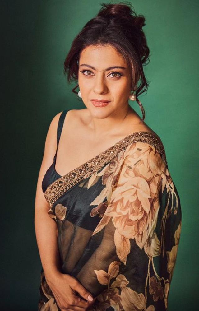Kajol turns attention with her perfect style as she dazzles in a saree with a floral pattern, embodying the height of refinement and flair.