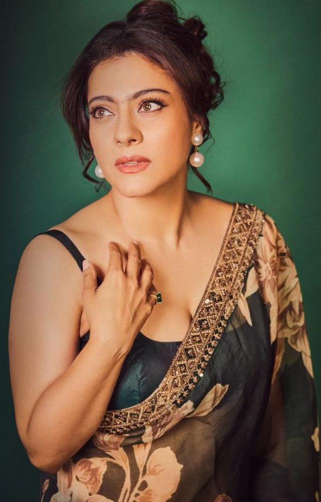Kajol wears a saree with a floral pattern with unmatched grace, displaying a wonderful combination of traditional and contemporary fashion.