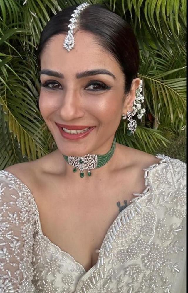 With a captivating smile, Raveena Tandon steals the spotlight, embodying timeless beauty and infectious happiness in every picture.