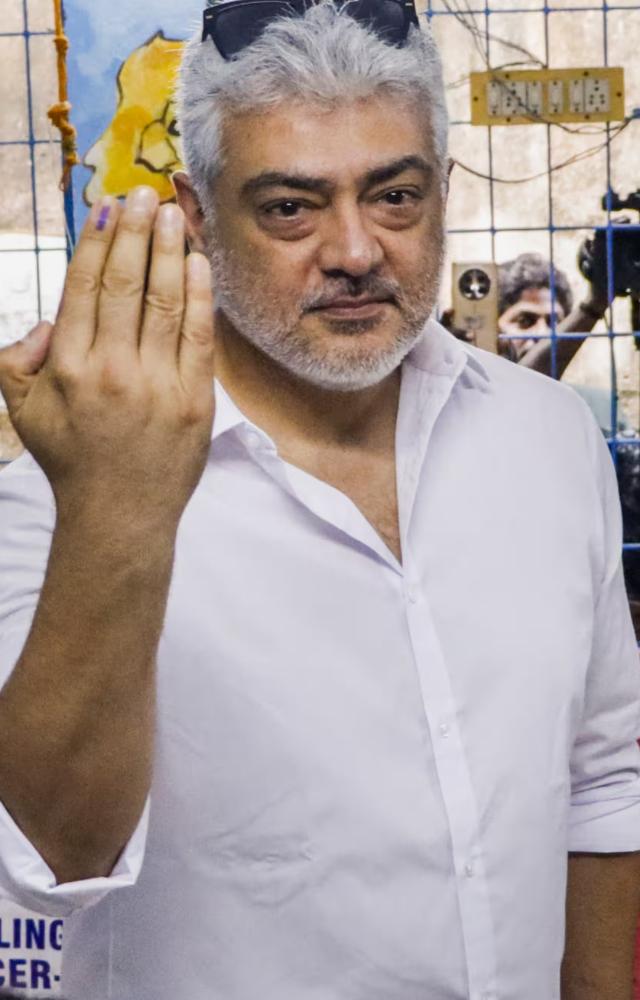 After casting a ballot in Chennai during the first round of the Lok Sabha elections, actor Ajith Kumar displays an indelible ink mark on his finger
