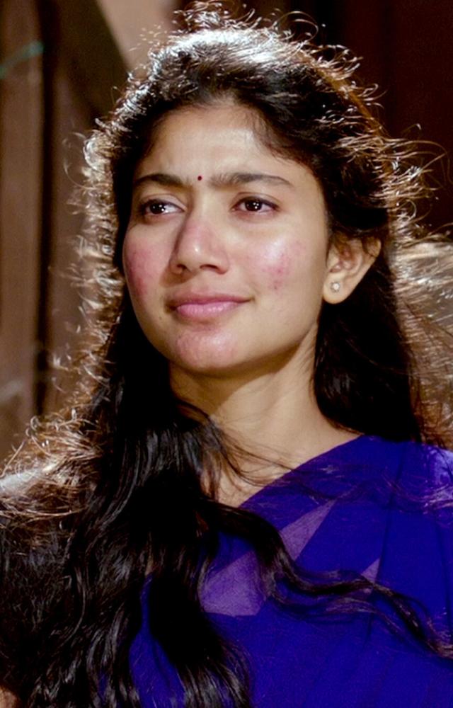 As Bhanumathi, she gave a powerful, rooted performance in this romantic drama. She brought raw energy to the Telugu screen.