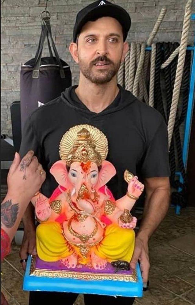 The Roshan family celebrates with a beautifully decorated pandal, where Hrithik Roshan often participates in the rituals with devotion.
