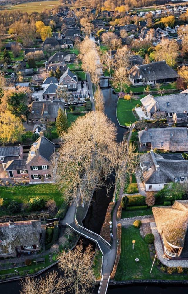 Known as the “Venice of the North,” this charming village has canals instead of roads. Boats and bikes rule here.