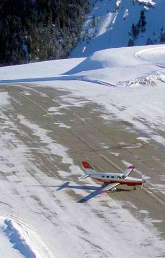 Built on a steep slope with no go-around—landing here feels like a ski jump.
