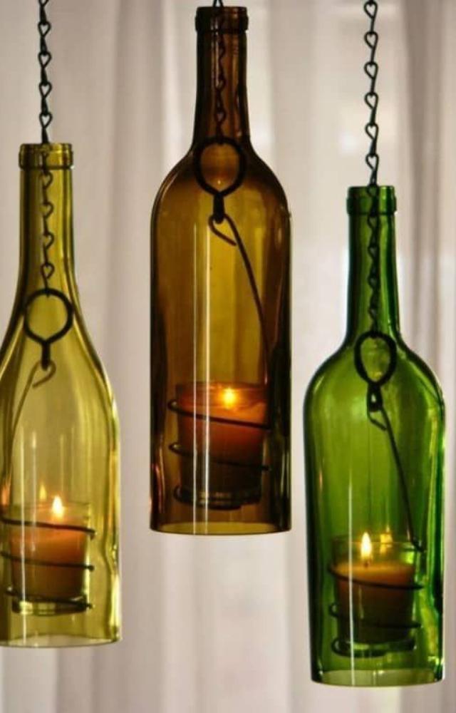 Paint and light up old glass bottles to create charming, eco-friendly table or corner lamps.
