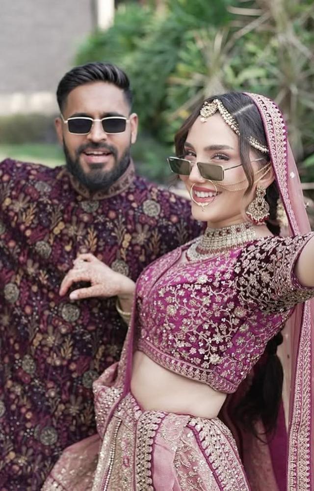 A joyous moment as the music sensation and Swalina say, “I do.”
