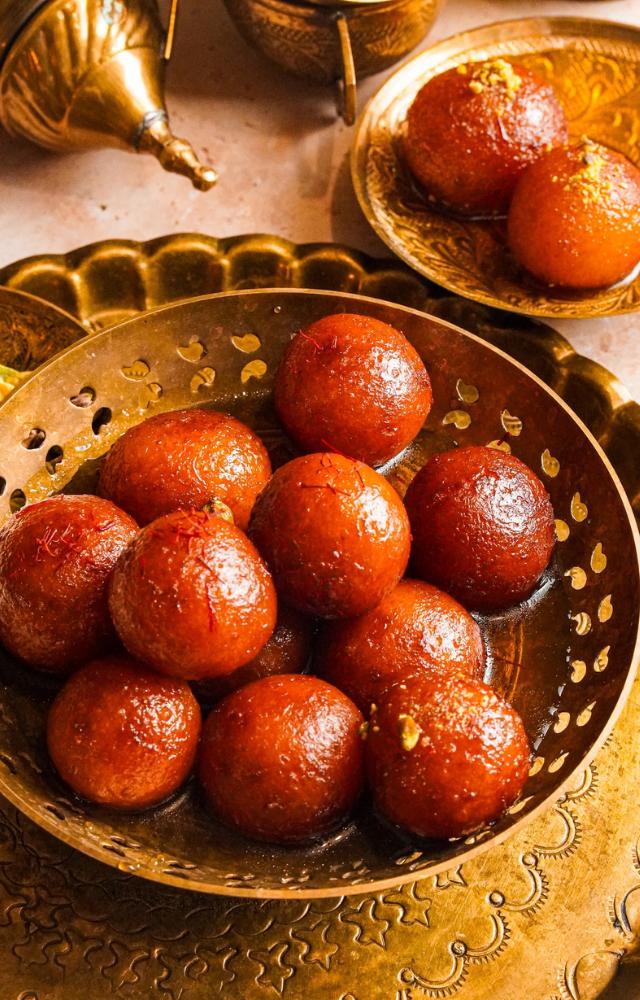 Soft, syrupy, and irresistible! These traditional milk-solid dumplings soaked in sugar syrup will bring joy to your Eid celebrations.