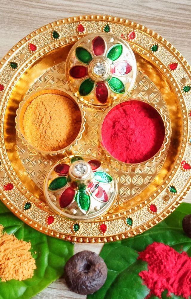 These sacred powders are used to apply tilak to the idol and devotees, symbolizing purity and protection.
