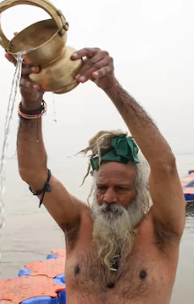 Devotees take a dip in holy rivers like the Ganges, believing it purifies the soul and washes away sins.