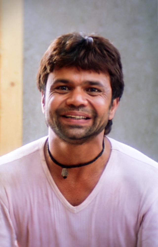 Chup Chup Ke`s hilarious sidekick who adds to the chaos with his quirky humor.