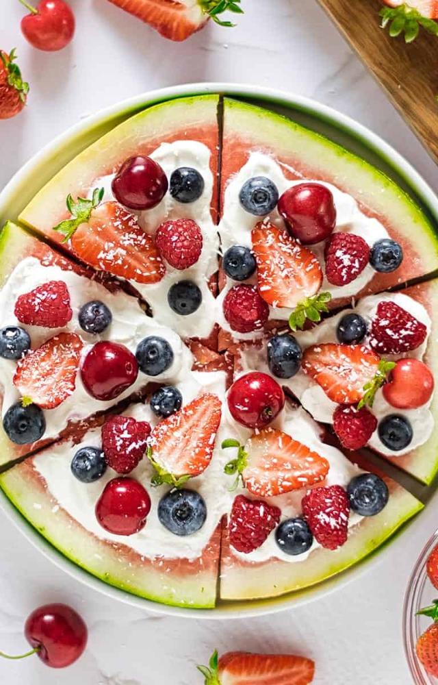 Swap dough for juicy watermelon slices topped with berries, mint, and yogurt—fresh, fun, and super photogenic.