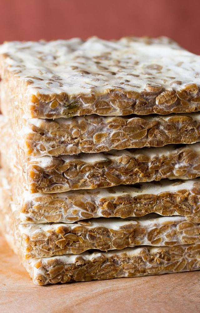 A fermented soy product with a firm texture and nutty flavor, tempeh offers more protein per serving than eggs.