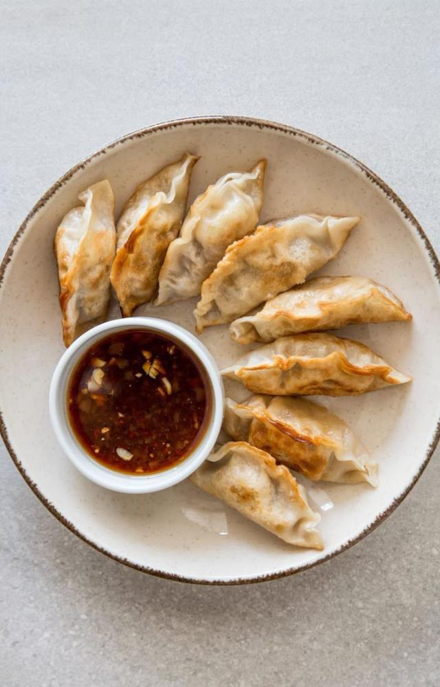 These Korean dumplings come with juicy fillings. Crispy or steamed, they’re a perfect comfort bite.

