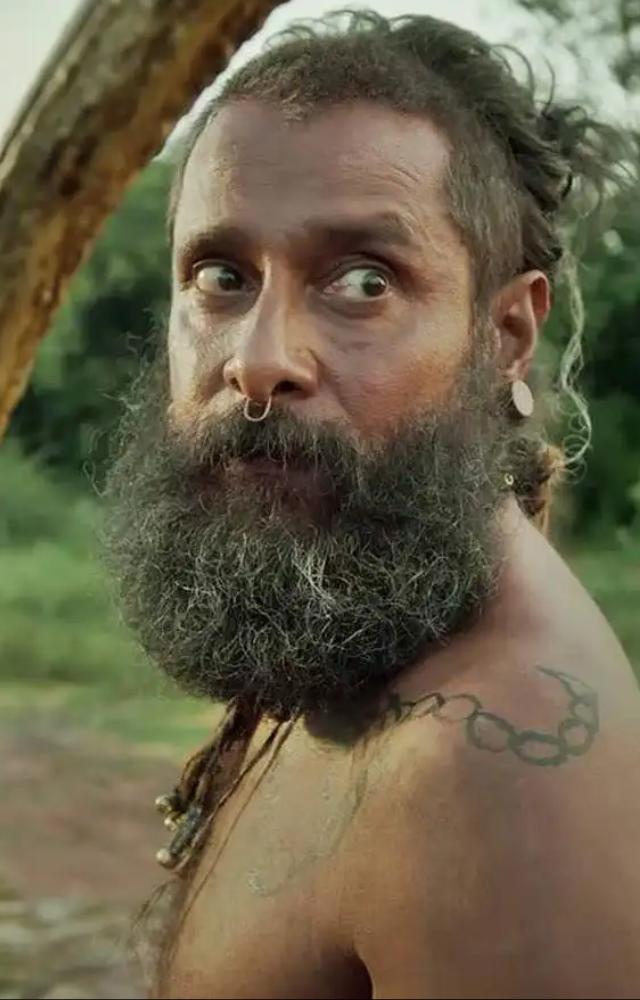 Set in a pre-independence era, Vikram transforms yet again. This gritty role shows his raw and rugged avatar like never before.
