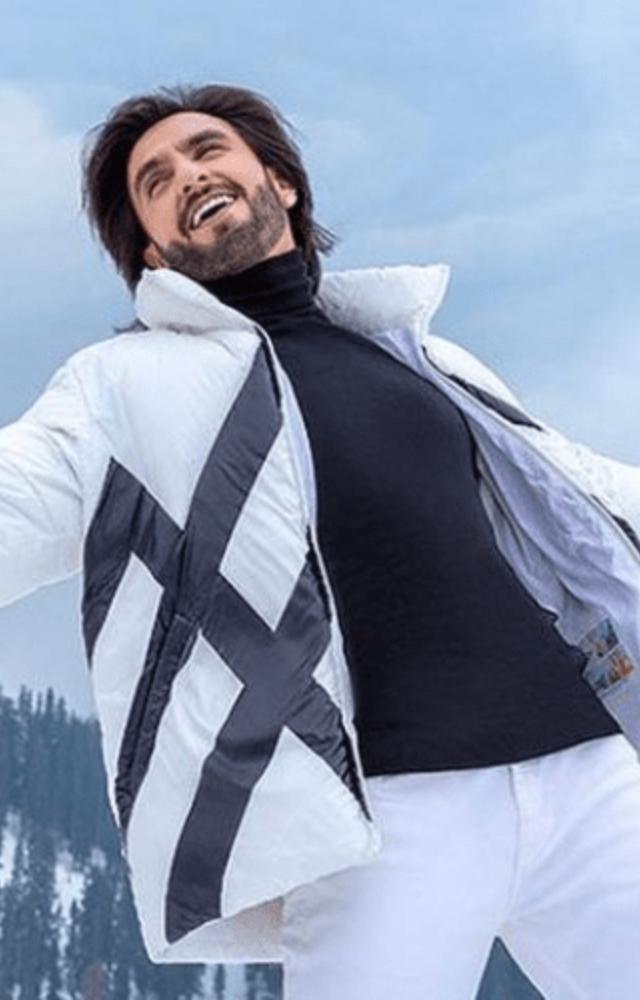 Ranveer Singh embraces bold winter fashion with vibrant layers and unique patterns.