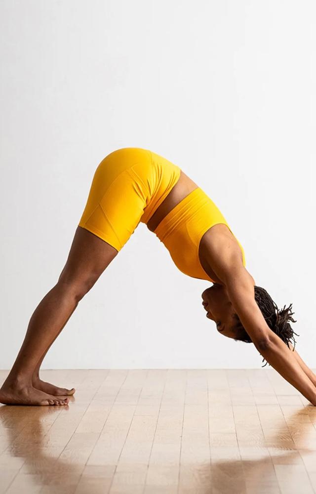 This pose stretches the hamstrings, calves, and spine while strengthening the arms, legs, and core. It relieves tension in the shoulders and lower back.