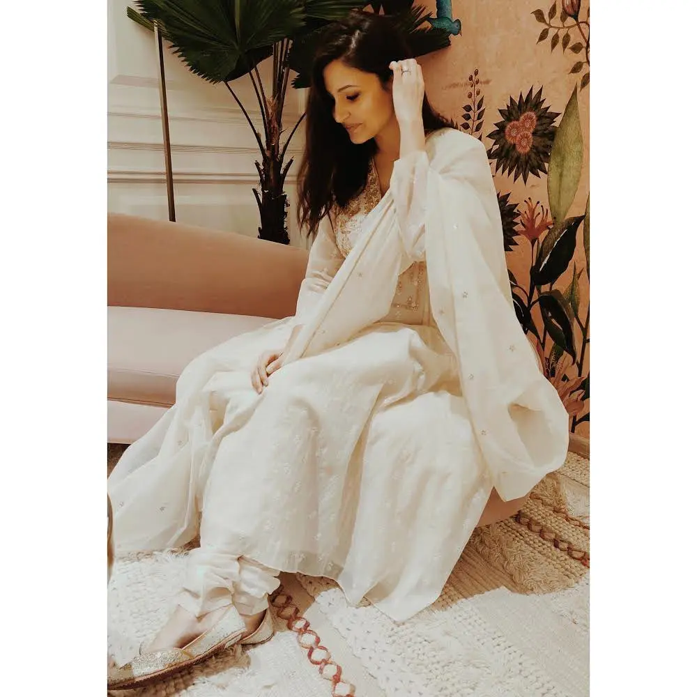 Anushka Sharma looked beautiful in an all-white suit as she posed candidly for a photo