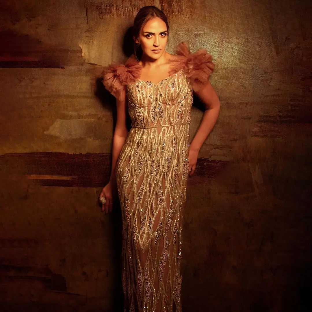 Esha Deol made a stylish statement in a vintage-inspired shimmery beige dress.