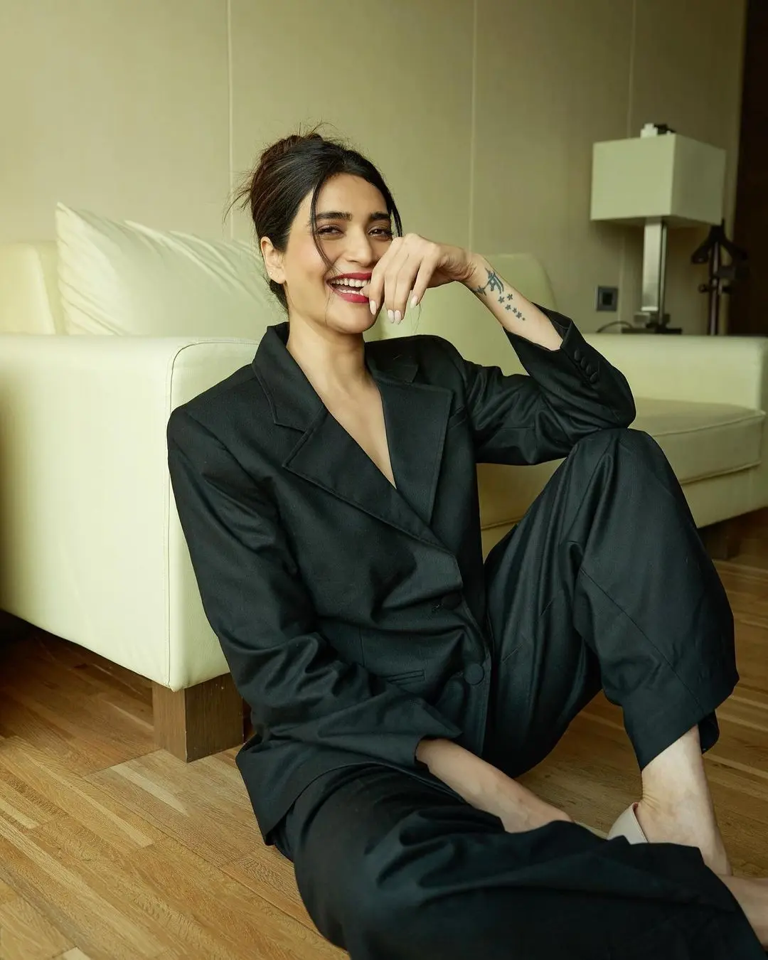Sometimes, when we want to lift our spirits, we decide to dress up, but there`s always that worry of overdoing it. Well, look no further! Karishma Tanna`s black jumpsuit is the answer. It`s bold, classy, and the perfect fit to impress your colleagues without going overboard