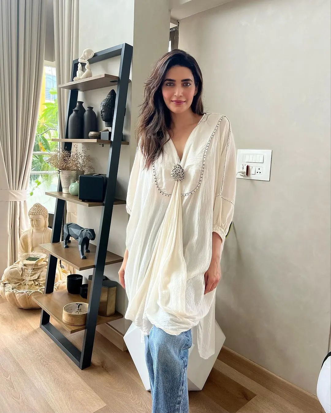 What particularly caught our attention is the stylish oxidized brooch, which adds a delightful Indo-Western touch to the ensemble. Karishma Tanna`s fashion sense is truly on point, blending traditional and contemporary elements effortlessly