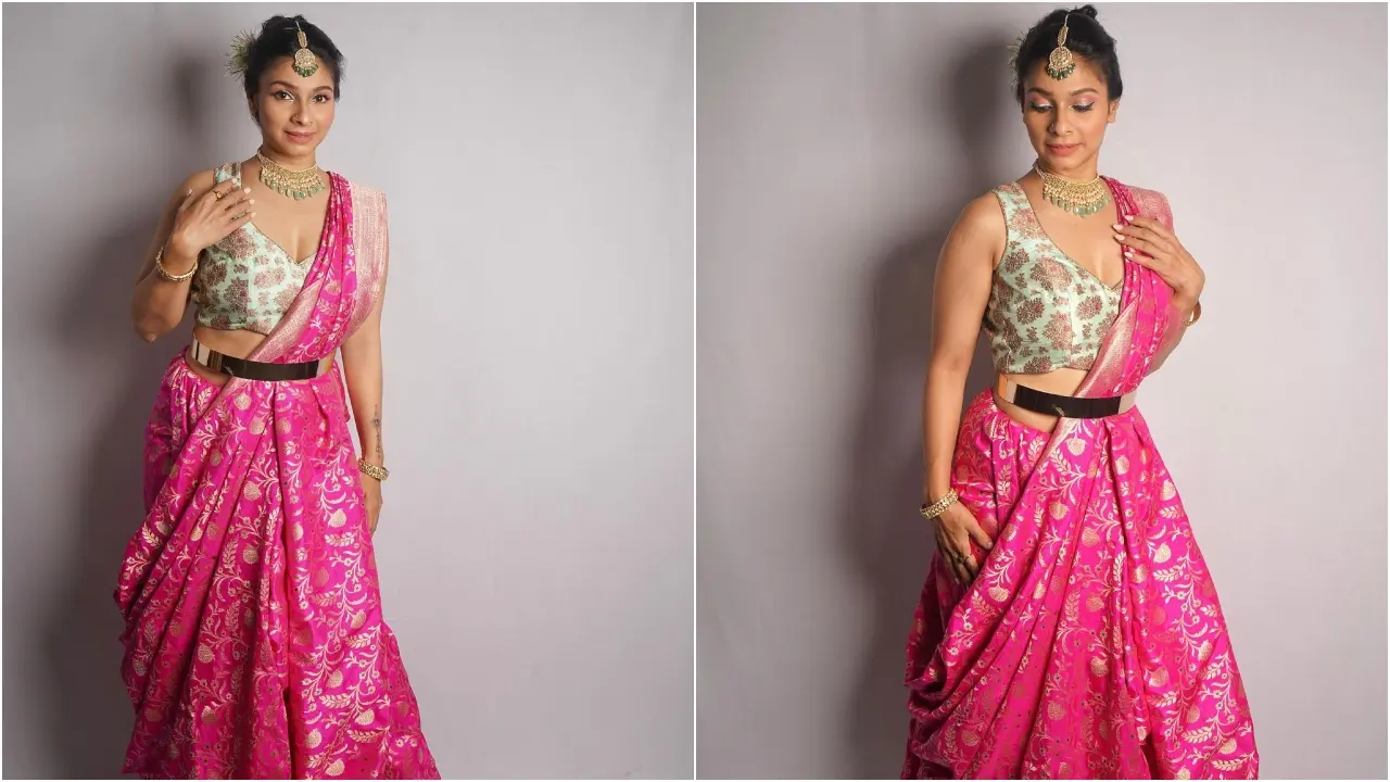 In this look, Tanishaa draped another saree in an indo-western style. This actress looked gorgeous