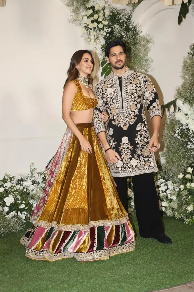 Lovebirds Sidharth Malhotra and Kiara Advani made a stylish entry. The actress wore a gorgeous multi-colour lehenga set and accessorized with heavy jewellery, leaving her hair open. On the other hand, Sidharth complemented his wife`s look and donned a black floral sherwani.