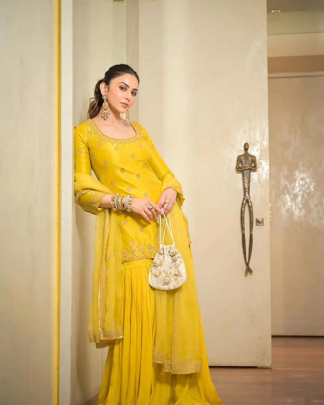 To top it off, she wore a pair of beautiful jhumkas, and her hair was neatly tied back in a ponytail