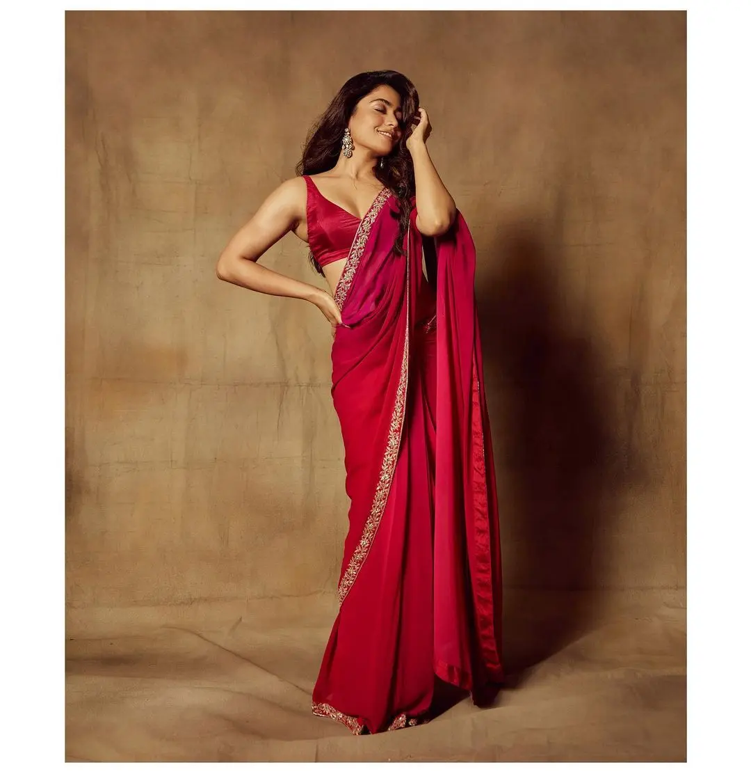 Red is the perfect colour for any festival, especially when worn in a saree. Take inspiration from Pushpa actress and slay your festive look