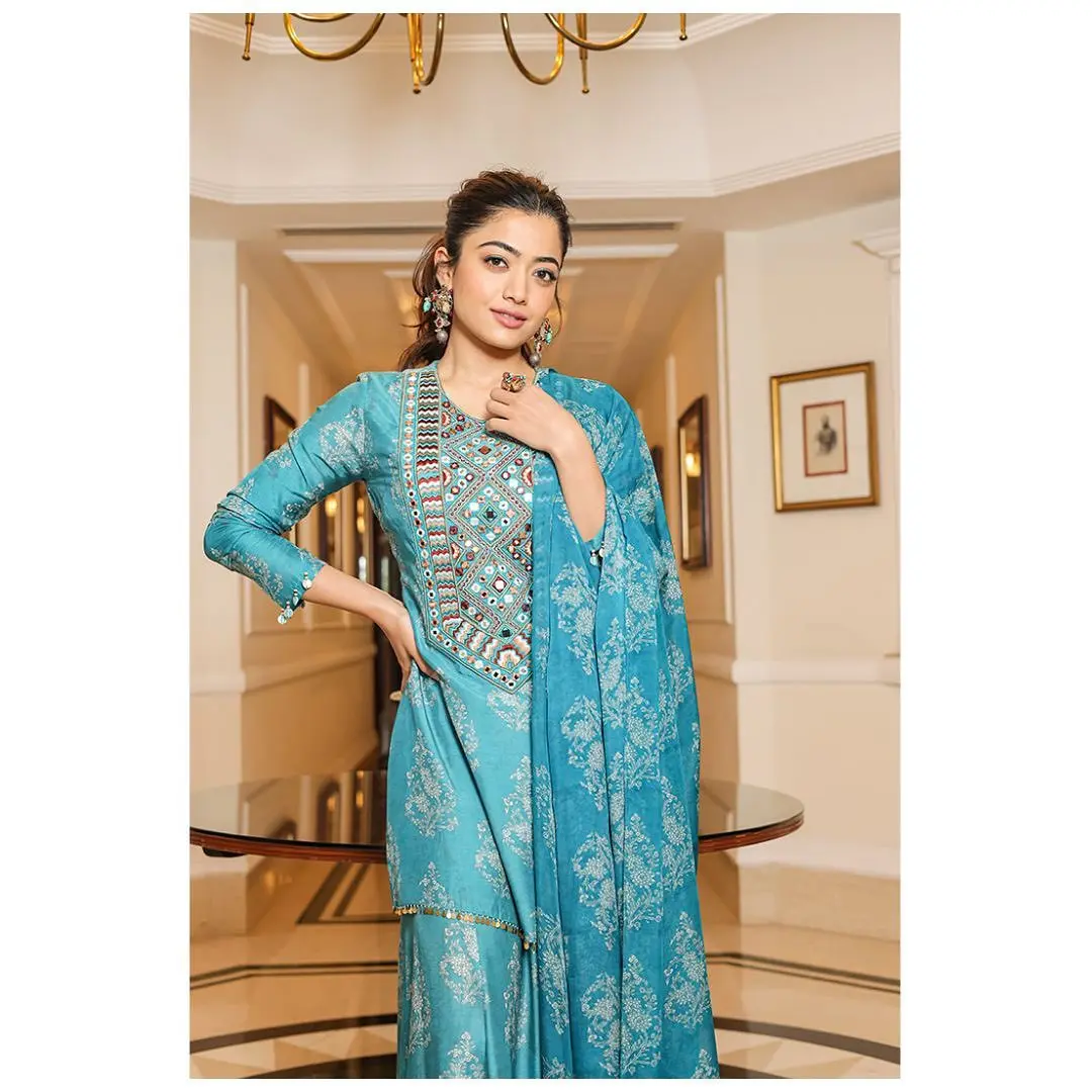 If you don`t want to hassle with dressing up in a saree for Diwali pooja, Rashmika`s simple blue suit with heavy embroidery maintains the festive vibe