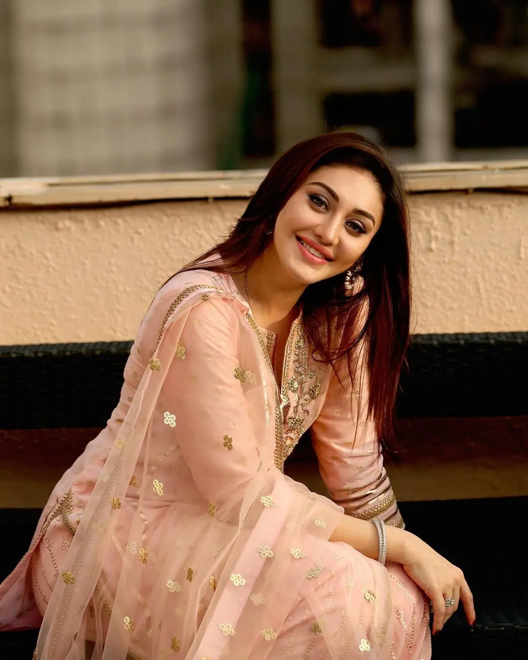 This peach coloured simple yet classy suit is an ideal choice for stealing the spotlight and making a statement as the perfect bridesmaid