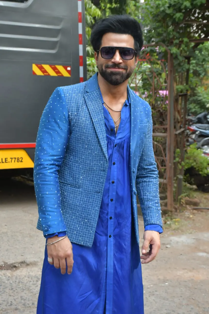 Rithvik Dhanjani looked handsome as he wore a blue kurta paired with a matching shimmery jacket 