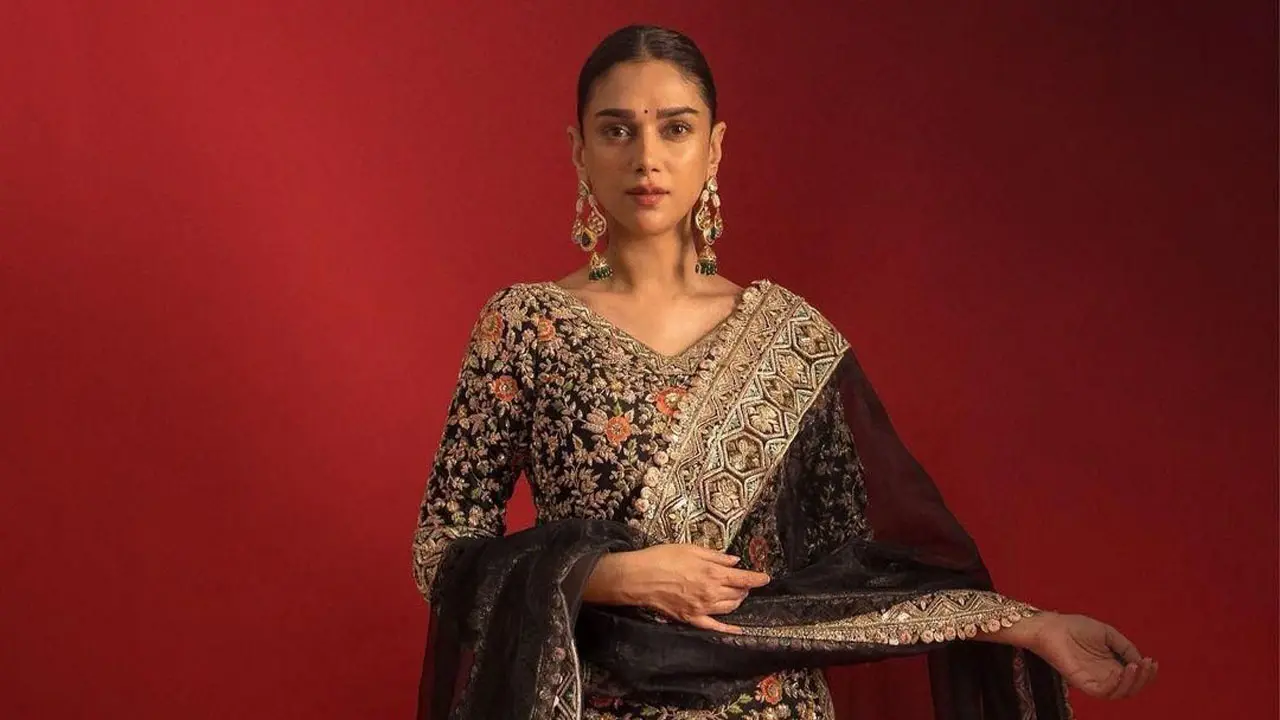 On the eve of Diwali, she wowed in a Manish Malhotra ebony silk sharara set with hand embroidered with vintage zari and flower scenic motifs.