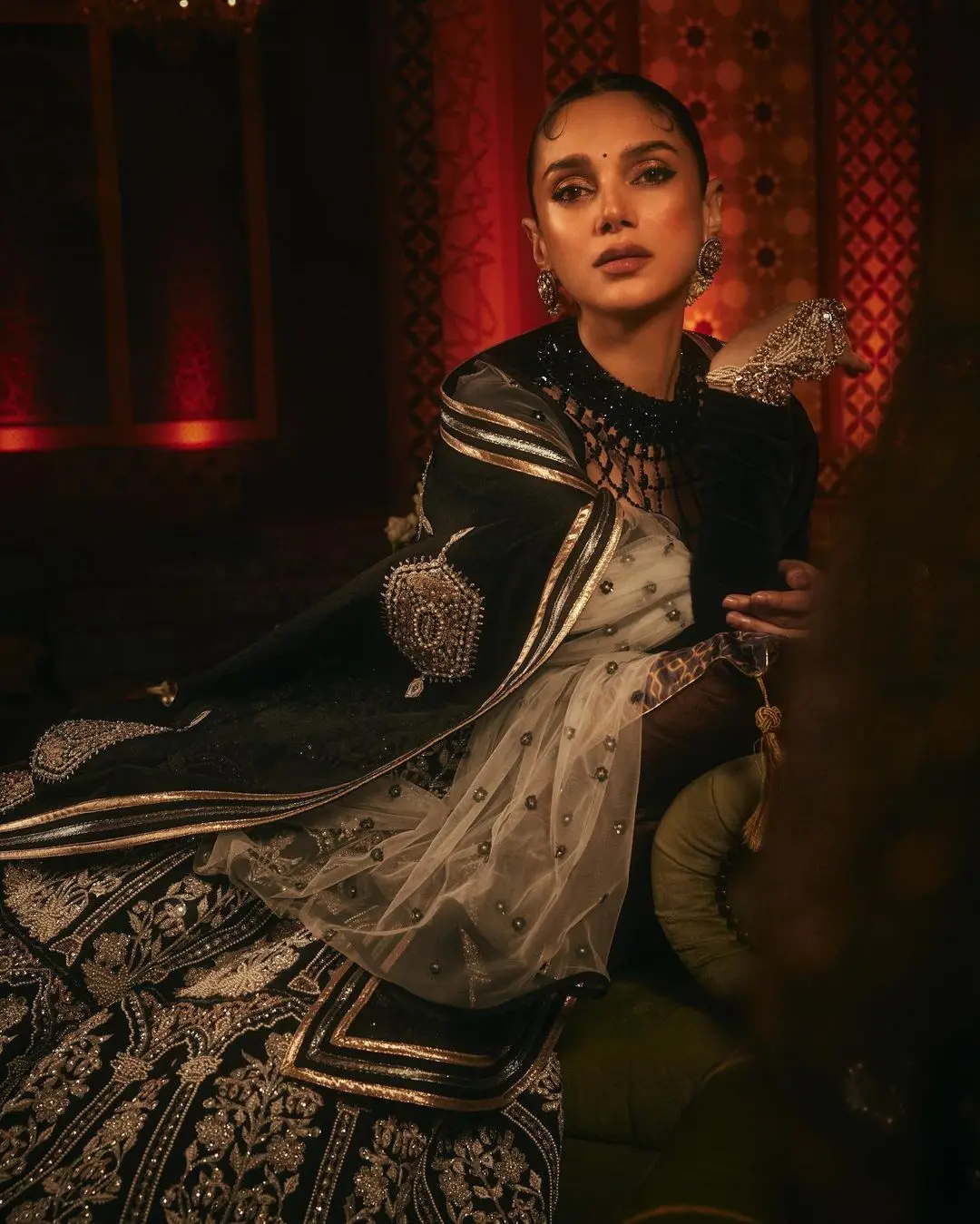 Aditi tied her hair back in a bun that allowed her beautiful face to be the center of attention