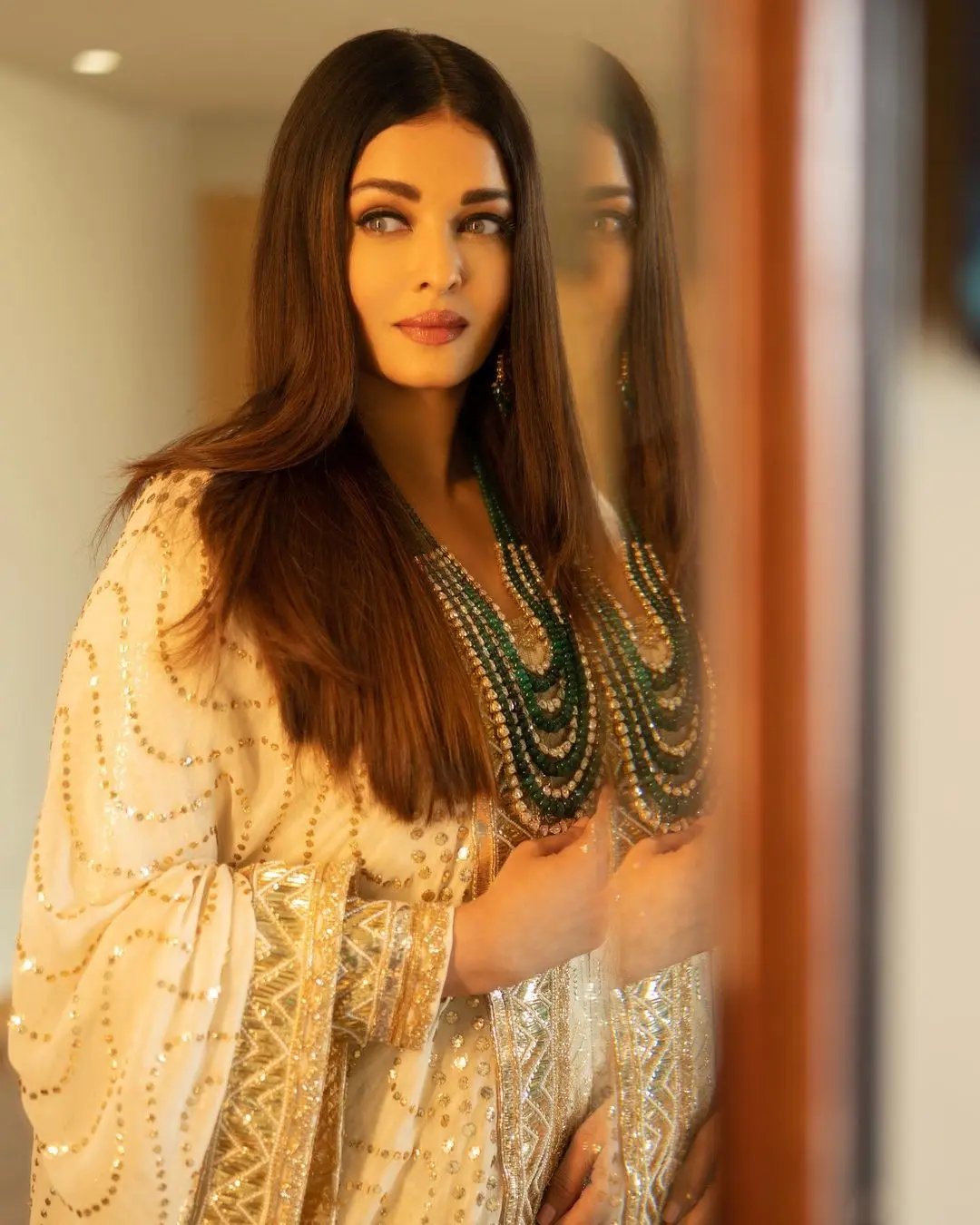 Adorned in a breathtaking white anarkali dress, Aishwarya Rai`s appearance transcended the ordinary, exuding an otherworldly charm.