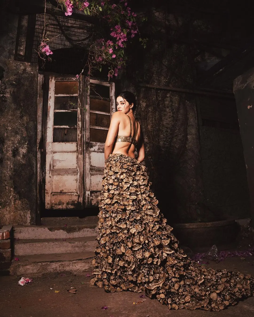 Ananya decided to keep it simple with no accessories, letting her outfit steal the spotlight. She went for makeup that included cheek contouring, shiny golden eyeshadow, and tinted lips, and her hair was neatly pulled back into a bun.