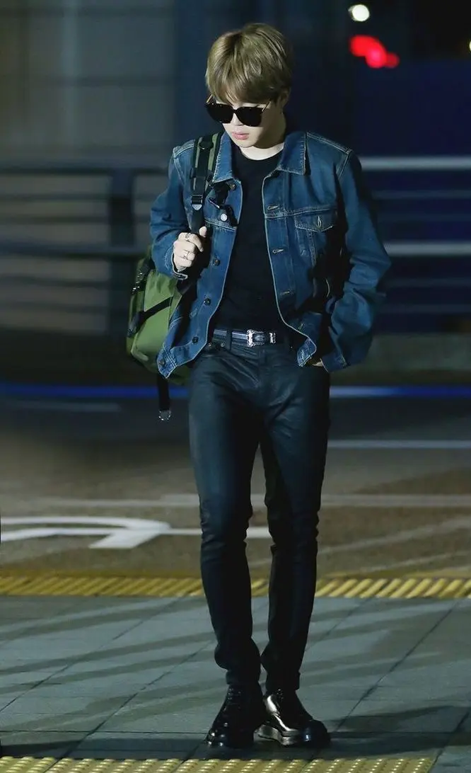 Jimin`s casual style is just as impressive as his formal looks. In one picture, he`s alongside Jin, rocking jeans, a black t-shirt, and a denim jacket. It`s a down-to-earth and relatable style that fans adore.