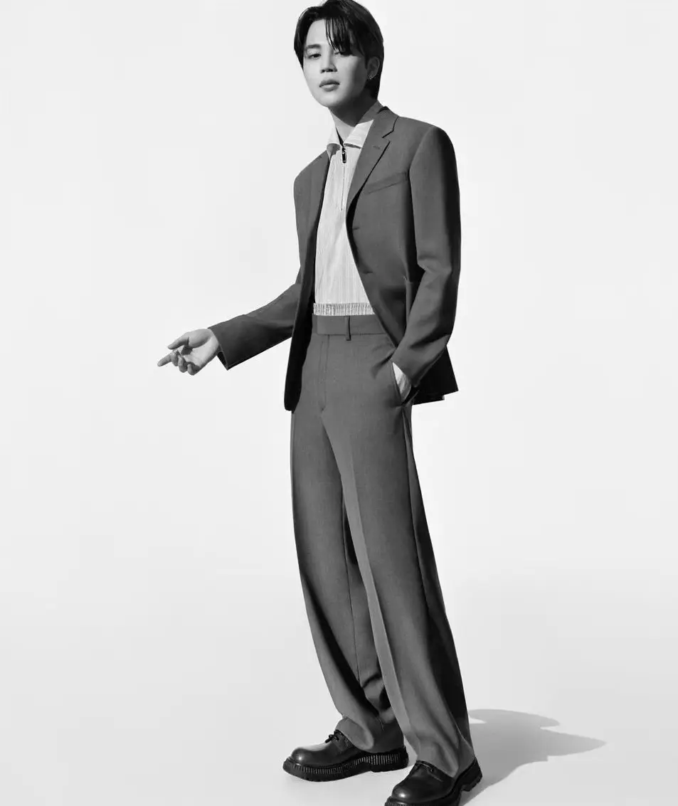 In a black and white photo that`s worth a thousand words, Jimin goes for a classic blazer and trousers.