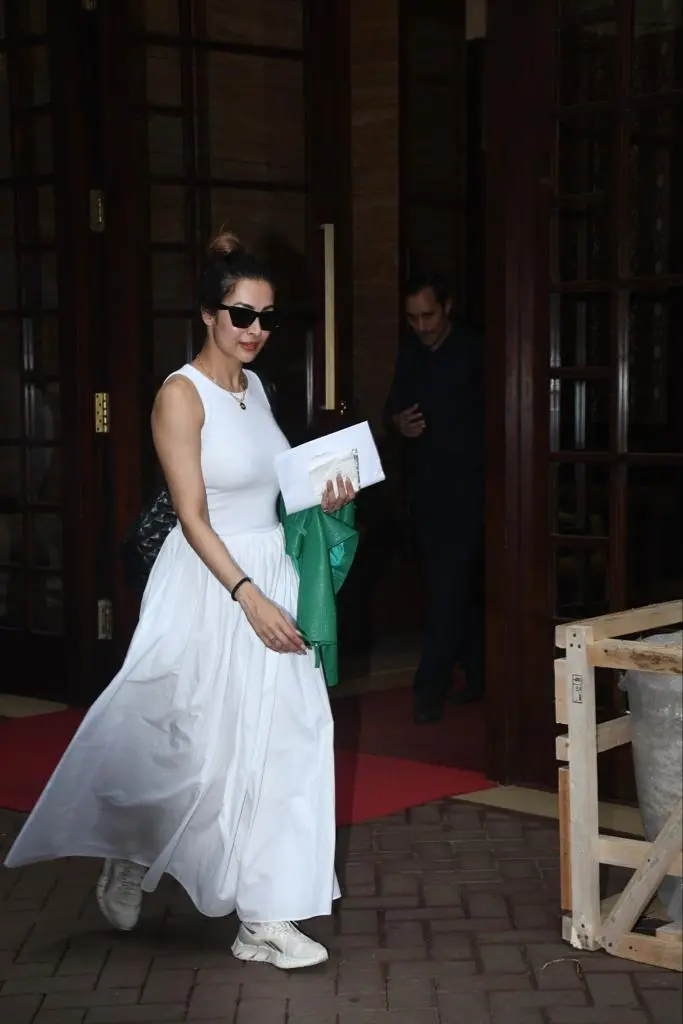 Malaika Arora opted for a white dress as she went out and about in the city