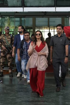 She was reportedly pleased to see the welcome boards honouring her and Raghav Chadha while being welcomed by airport employees.