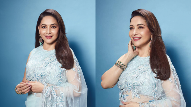 Nisha aka Madhuri Dixit in light Blue Saree
