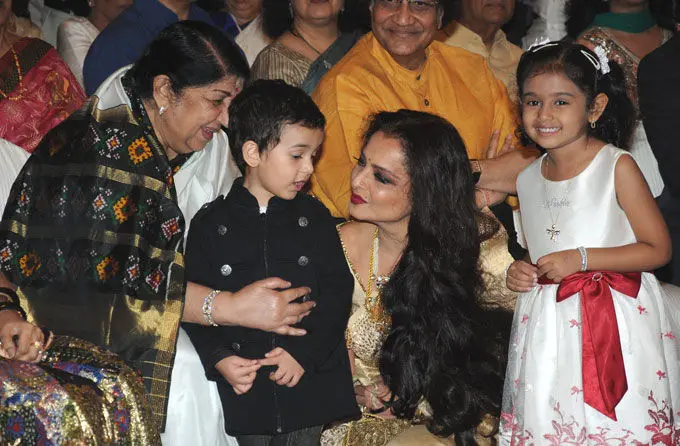 Rekha was alleged to have a much-publicised love affair with superstar Amitabh Bachchan. However, it was too rubbished by the actress. In pic: Rekha with Lata Mangeshkar at a function.